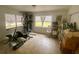 Bright room with multiple windows and exercise equipment at 701 S Delaware Ave, Deland, FL 32720