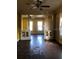 Living room featuring pillars and built-in cabinets at 708 S Laurel Ave, Sanford, FL 32771