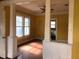 Living room featuring pillars and an open window at 708 S Laurel Ave, Sanford, FL 32771