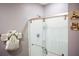 Bathroom featuring glass enclosed shower, towel rack and accessories at 756 Kindred Ln, Auburndale, FL 33823