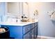 Bathroom featuring stylish vanity, sink, and framed mirror at 756 Kindred Ln, Auburndale, FL 33823