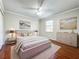 Bedroom featuring hardwood floors, a ceiling fan, and neutral decor at 8438 Diamond Cove Cir, Orlando, FL 32836