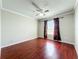 Bedroom featuring hardwood floors and a ceiling fan at 8438 Diamond Cove Cir, Orlando, FL 32836