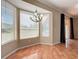 Dining area with large windows and natural light, perfect for Gathering meals at 8438 Diamond Cove Cir, Orlando, FL 32836