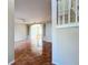 Spacious living room showcasing tile flooring and a seamless transition to the next room at 8438 Diamond Cove Cir, Orlando, FL 32836