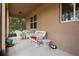 Enclosed patio with outdoor seating, perfect for relaxation and entertainment at 11619 Chateaubriand Ave, Orlando, FL 32836