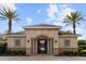 Pool gate with well manicured plants and palm trees at 11619 Chateaubriand Ave, Orlando, FL 32836