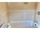 Bathtub with tile surround at 12314 Virginia Dr, Leesburg, FL 34788