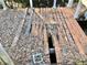 Dilapidated wooden dock with missing planks and debris, surrounded by dark water at 12314 Virginia Dr, Leesburg, FL 34788