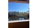 Condominium complex featuring a pool and gazebo, as seen from a balcony at 12521 Floridays Resort Dr # 206F, Orlando, FL 32821
