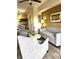 Comfortable living room with stylish furniture, neutral color palette, and modern decor at 12521 Floridays Resort Dr # 206F, Orlando, FL 32821