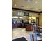 Cozy Palm Cafe with menu boards, an order counter, and seating area for a relaxed dining experience at 12521 Floridays Resort Dr # 206F, Orlando, FL 32821