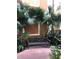 A picturesque park bench sits in a lush community garden at 12521 Floridays Resort Dr # 206F, Orlando, FL 32821