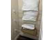Organized closet shelving with linens for convenient storage solutions at 12521 Floridays Resort Dr # 206F, Orlando, FL 32821