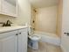 Cozy bathroom with shower and tub combo and white vanity at 166 Scottsdale Sq # 166, Winter Park, FL 32792