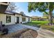 Charming single-story home featuring a well-maintained lawn, a modern front door, and walkway at 2294 Lakeview Ave, Clermont, FL 34711