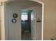 Bathroom featuring tile flooring and a curtained window with a view of the toilet at 231 Cranbrook Dr, Kissimmee, FL 34758