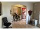 Cozy entryway with decorative accents and tiled flooring at 231 Cranbrook Dr, Kissimmee, FL 34758