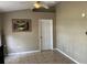 Bright living room with tiled floors, natural light, and neutral wall paint at 231 Cranbrook Dr, Kissimmee, FL 34758