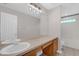 Bathroom with double sink vanity, decorative lighting, neutral walls, and tile flooring at 2362 Blossomwood Dr, Oviedo, FL 32765