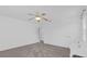 Empty bedroom features a ceiling fan, carpet, and two windows at 2362 Blossomwood Dr, Oviedo, FL 32765