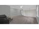 Upstairs loft featuring carpeting, and plenty of natural light at 2362 Blossomwood Dr, Oviedo, FL 32765