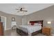 Well-lit main bedroom features a ceiling fan, and wood floors at 2362 Blossomwood Dr, Oviedo, FL 32765