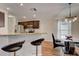 Open dining area next to kitchen with stainless steel appliances at 2604 Hollow Ln, Leesburg, FL 34748