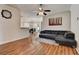 Spacious living room features wood floors and modern furnishings at 2604 Hollow Ln, Leesburg, FL 34748