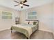 Bedroom featuring natural light, neutral color palette and wood-look flooring at 33 Sunset Dr, Debary, FL 32713