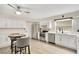 Bright kitchen featuring white cabinetry, stainless steel appliances and updated countertops at 33 Sunset Dr, Debary, FL 32713