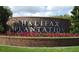 Halifax Plantation brick entrance sign framed by landscaping at 3315 Newbliss Cir, Ormond Beach, FL 32174