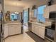 Bright kitchen with white cabinetry, stainless steel appliances, and ample counter space at 3315 Newbliss Cir, Ormond Beach, FL 32174