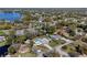 Aerial view of a home with a pool in a lake community, showing the surrounding neighborhood at 382 Frances Ave, Casselberry, FL 32707