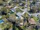 Aerial view of a home with a pool, highlighting its spacious lot and position within a quiet neighborhood at 382 Frances Ave, Casselberry, FL 32707