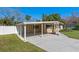 Covered carport featuring multiple supports and a well-maintained lawn at 382 Frances Ave, Casselberry, FL 32707