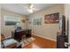 Cozy home office with hardwood floors and a ceiling fan at 382 Frances Ave, Casselberry, FL 32707