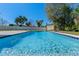 Sparkling pool with blue tile trim and an open backyard perfect for relaxing and entertaining outdoors at 382 Frances Ave, Casselberry, FL 32707