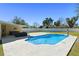 Backyard oasis with a sparkling in-ground pool, patio area, and privacy fence at 382 Frances Ave, Casselberry, FL 32707