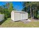 Outdoor shed with a ramp and a double door providing outdoor storage space at 382 Frances Ave, Casselberry, FL 32707