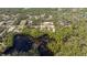 Aerial view of the home and community is close to a beautiful pond at 41915 Aspen St, Eustis, FL 32736