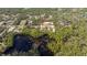 Aerial view of the community shows home and proximity to a beautiful pond at 41915 Aspen St, Eustis, FL 32736