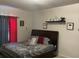 Comfortable main bedroom with tasteful decor, soft lighting, and a cozy bed at 504 Delido Way, Kissimmee, FL 34758