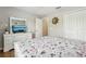 Bedroom with a dresser, mirror, closet, and tv at 620 Orange Cosmos Blvd, Davenport, FL 33837