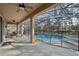 Screened-in pool offers a refreshing escape with an attached covered patio area and ceiling fans at 620 Orange Cosmos Blvd, Davenport, FL 33837