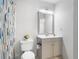 Bathroom with modern vanity, large mirror, neutral tones, and full shower at 629 Dory Ln # 303, Altamonte Springs, FL 32714