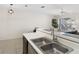 Bright kitchen with modern appliances and a view of the open floor plan at 629 Dory Ln # 303, Altamonte Springs, FL 32714