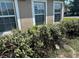 Well-maintained front yard with green shrubs near the house at 6743 Sw 129Th St, Ocala, FL 34473