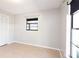 Empty bedroom featuring tile flooring and a large window at 690 Shady Ct, Altamonte Springs, FL 32701