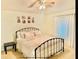 Tranquil bedroom with neutral decor, a ceiling fan, and natural light streaming through the window at 730 Garberia Dr, Davenport, FL 33837